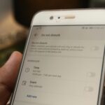 Close-up of a smartphone displaying 'Do Not Disturb' settings with active options.