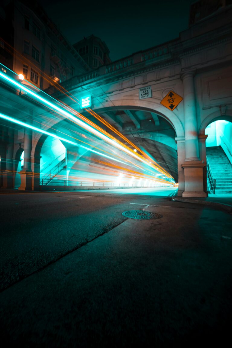 Long exposure capturing light trails in the Stockton Tunnel, San Francisco, creating a dynamic urban scene.